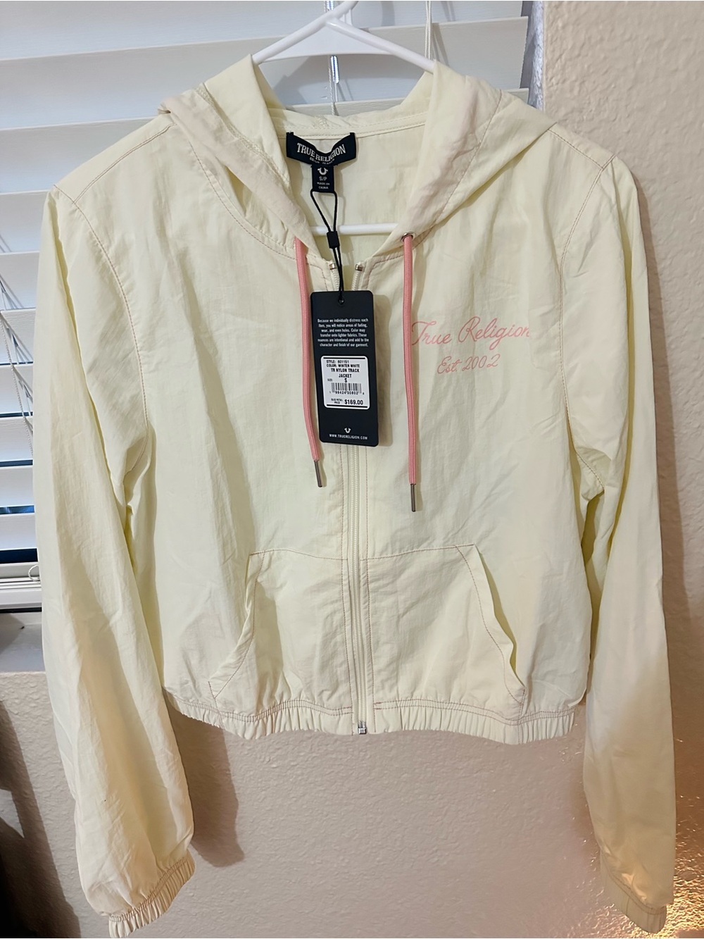 True Religion Cream Hooded Bomber Jacket with Pink Drawcords